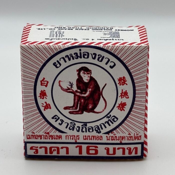 White Monkey Holding Peach Brand Medicated Balm